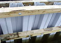 securing waler boards in seawall installation